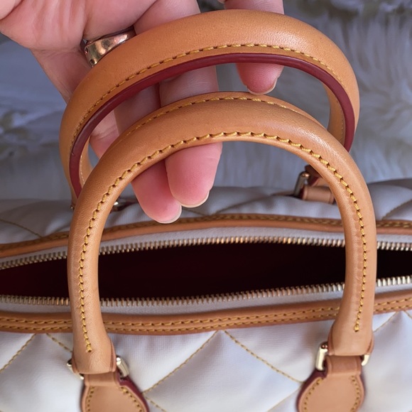 Dooney and Bourke 💯% Authentic - Picture 4 of 7